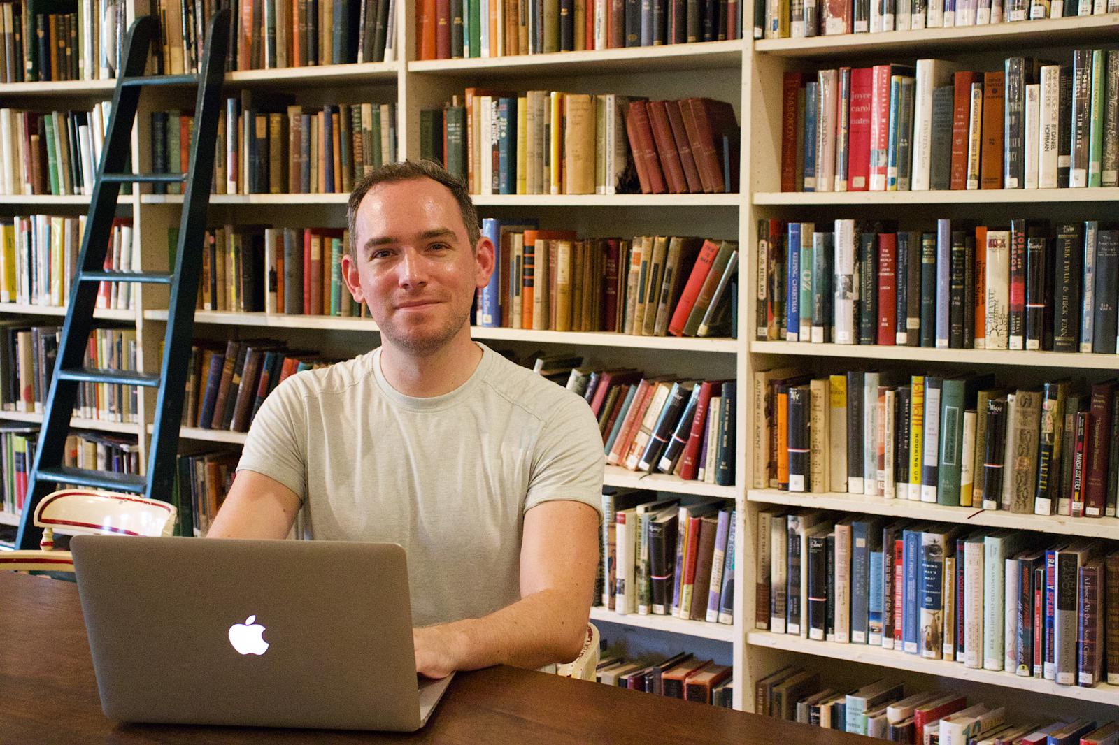 Photo of me working at the Providence Athenaeum.